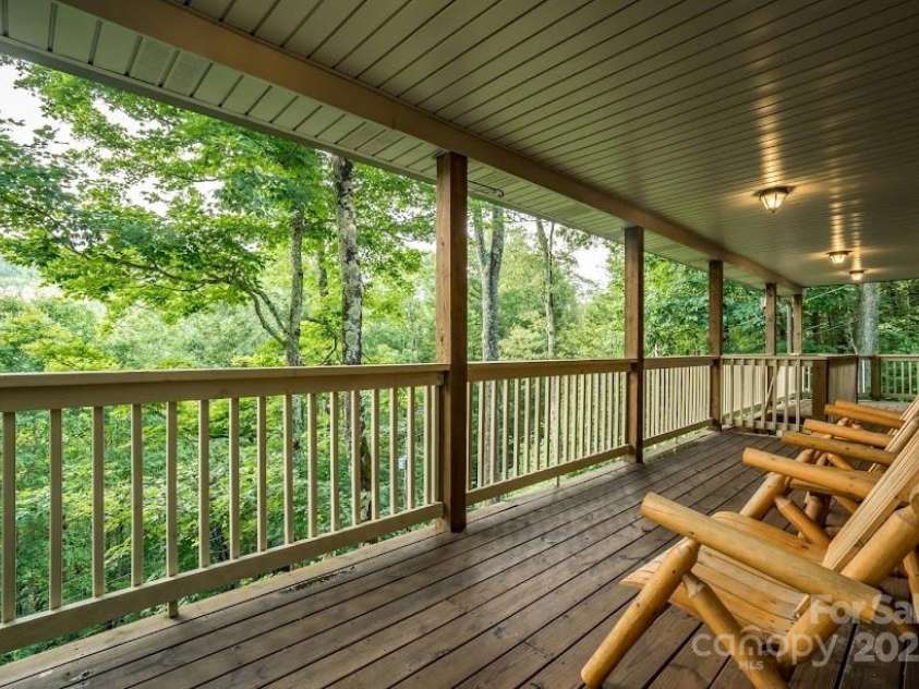 70 Double Back Lane, Mars Hill, NC 28754.  MLS# CAR4304443, YatesRealty ID 2519. Tranquill Covered Deck