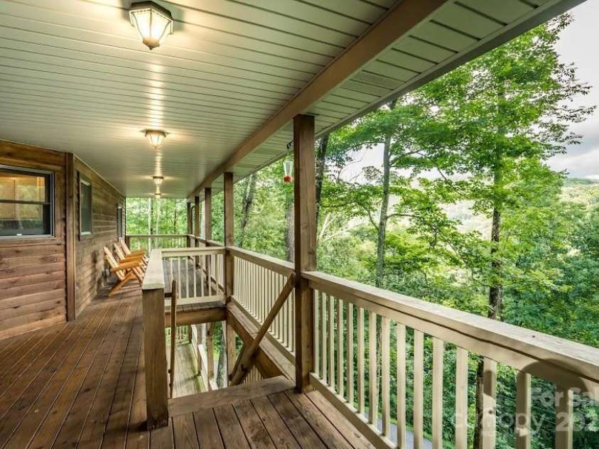 70 Double Back Lane, Mars Hill, NC 28754.  MLS# CAR4304443, YatesRealty ID 2519. Tranquill Covered Deck