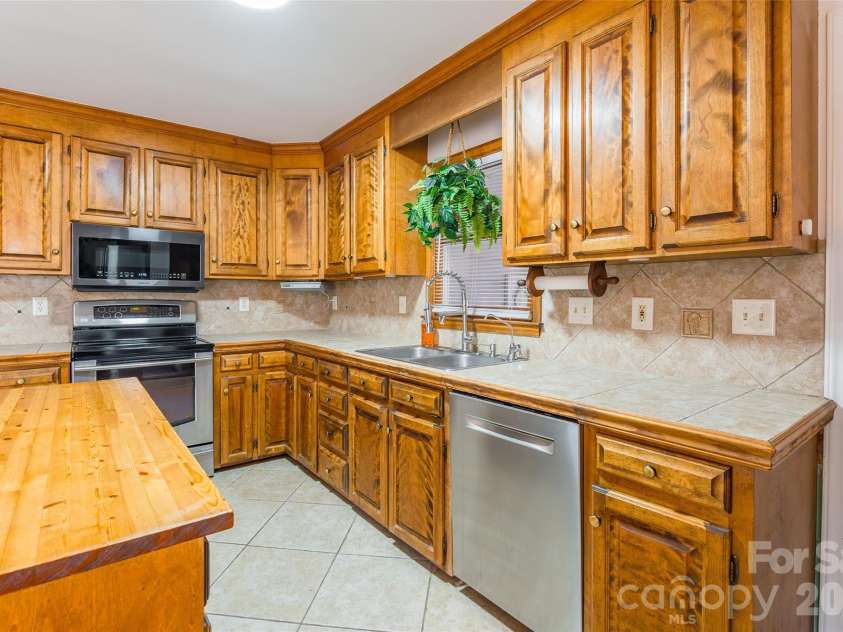 8230 Quail Hollow Drive, Harrisburg, NC 28075.  MLS# CAR4329712, YatesRealty ID 2519. 