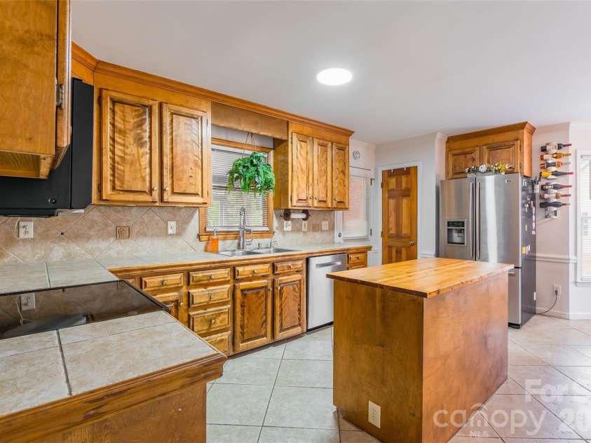 8230 Quail Hollow Drive, Harrisburg, NC 28075.  MLS# CAR4329712, YatesRealty ID 2519. 