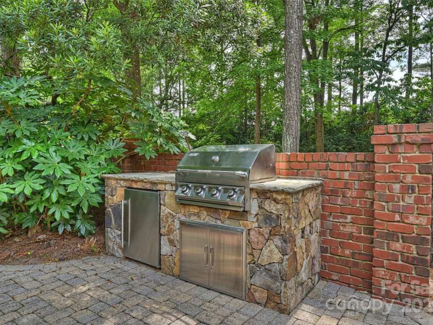 14652 Villalonga Lane, Charlotte, NC 28277.  MLS# CAR4265221, YatesRealty ID 25190. Built in outdoor grill and refrigerator