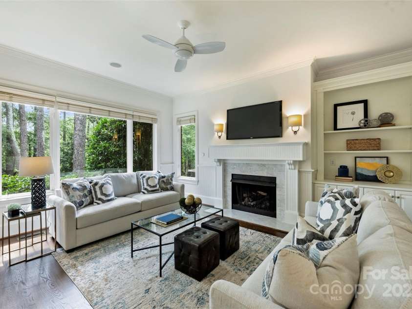 14652 Villalonga Lane, Charlotte, NC 28277.  MLS# CAR4265221, YatesRealty ID 25190. Family room with fire place and built-ins