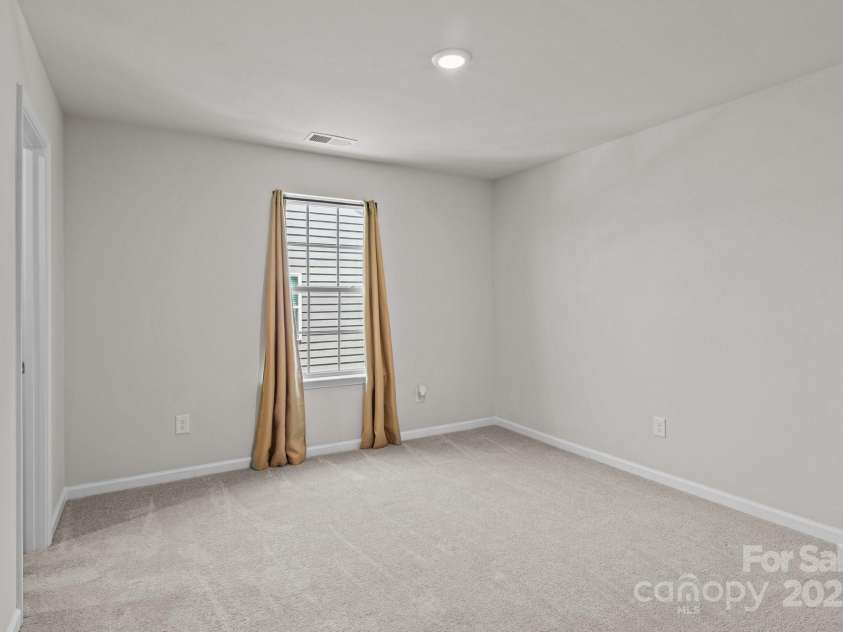 169 Rooster Tail Lane, Troutman, NC 28166.  MLS# CAR4272207, YatesRealty ID 25193. Bedroom 2 on the second floor