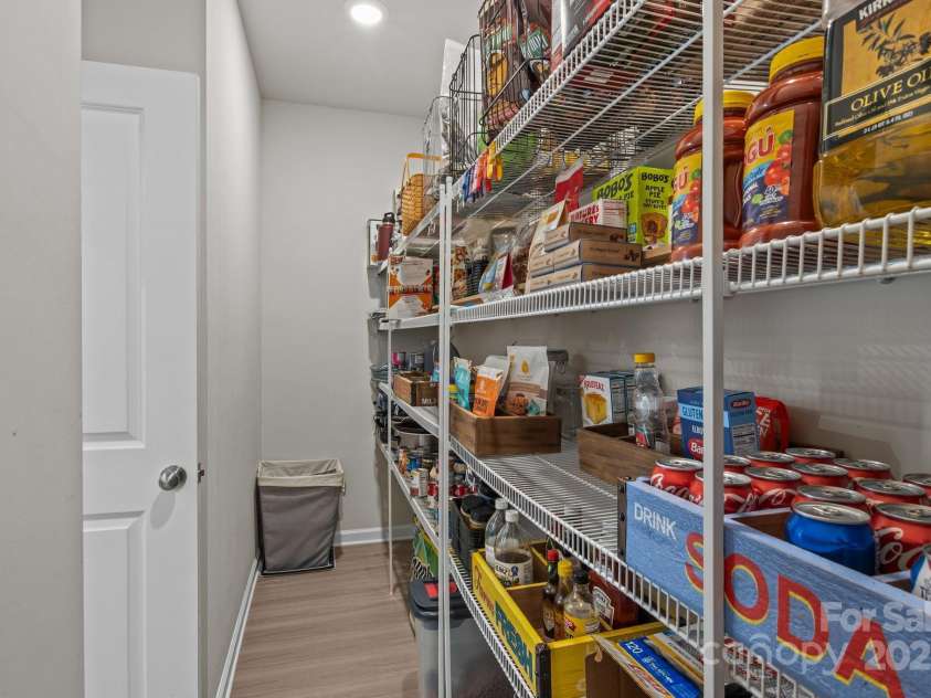 169 Rooster Tail Lane, Troutman, NC 28166.  MLS# CAR4272207, YatesRealty ID 25193. Large walk-in pantry for all your kitchen goods