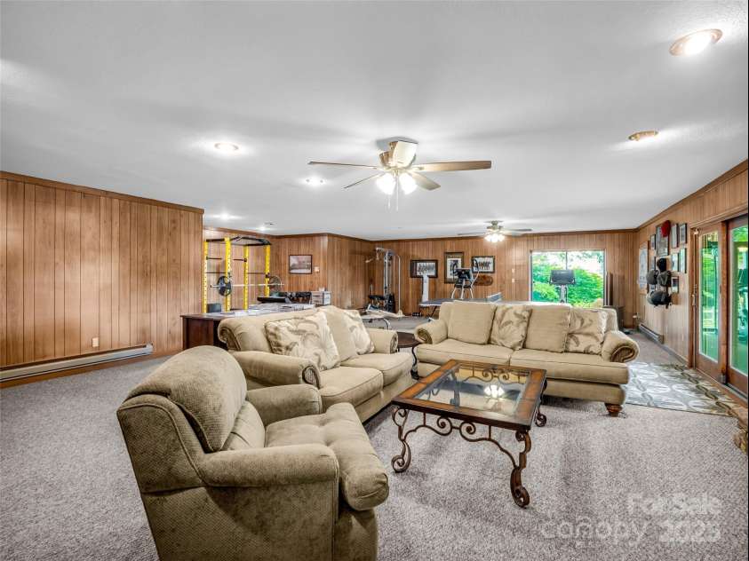 11 Bannerwood Drive, Horse Shoe, NC 28742.  MLS# CAR4257161, YatesRealty ID 25194. Den in basement