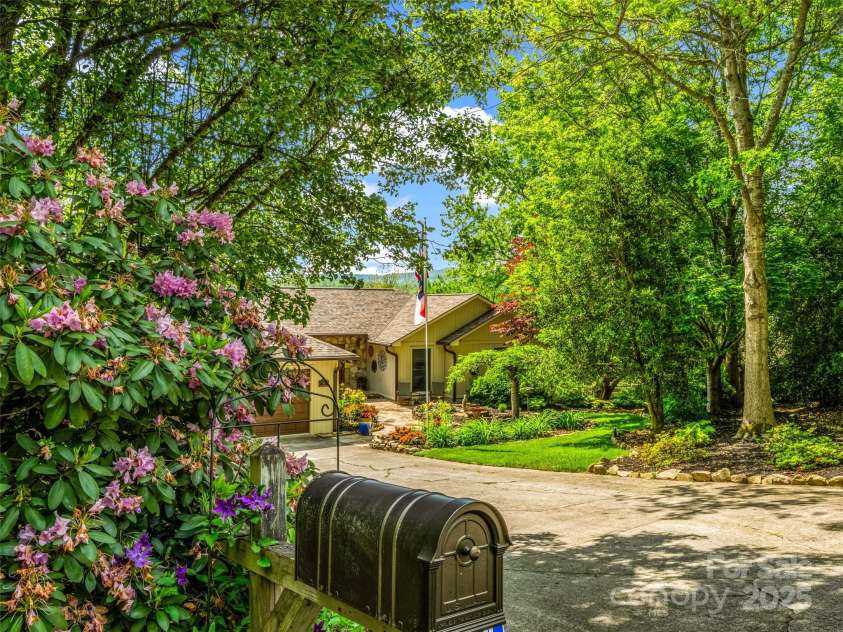 11 Bannerwood Drive, Horse Shoe, NC 28742.  MLS# CAR4257161, YatesRealty ID 25194. Entering driveway to private home in Cul-de-sac