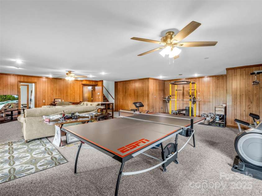 11 Bannerwood Drive, Horse Shoe, NC 28742.  MLS# CAR4257161, YatesRealty ID 25194. Gameroom/Workout area