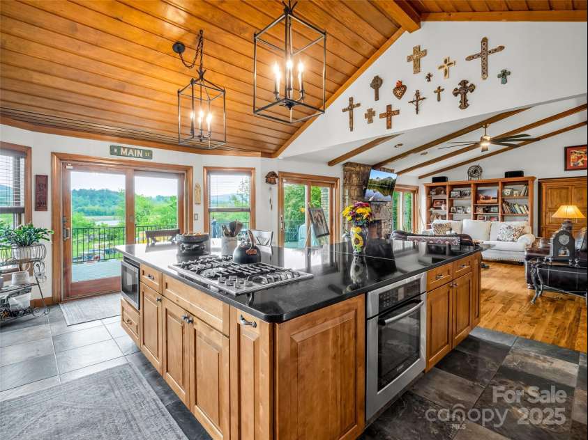 11 Bannerwood Drive, Horse Shoe, NC 28742.  MLS# CAR4257161, YatesRealty ID 25194. Kitchen with stainless steel appliances-Gas stove top