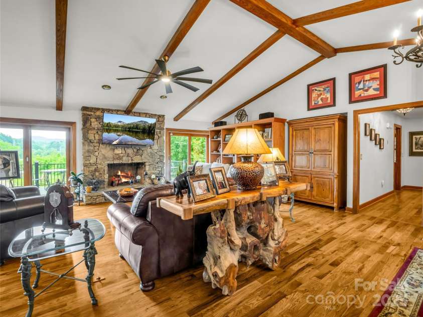 11 Bannerwood Drive, Horse Shoe, NC 28742.  MLS# CAR4257161, YatesRealty ID 25194. Living room with gas logs