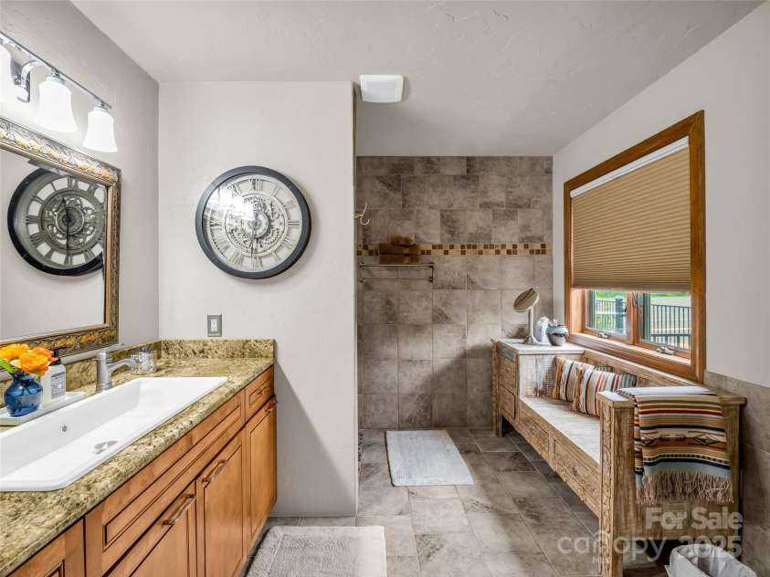 11 Bannerwood Drive, Horse Shoe, NC 28742.  MLS# CAR4257161, YatesRealty ID 25194. Primary Bathroom