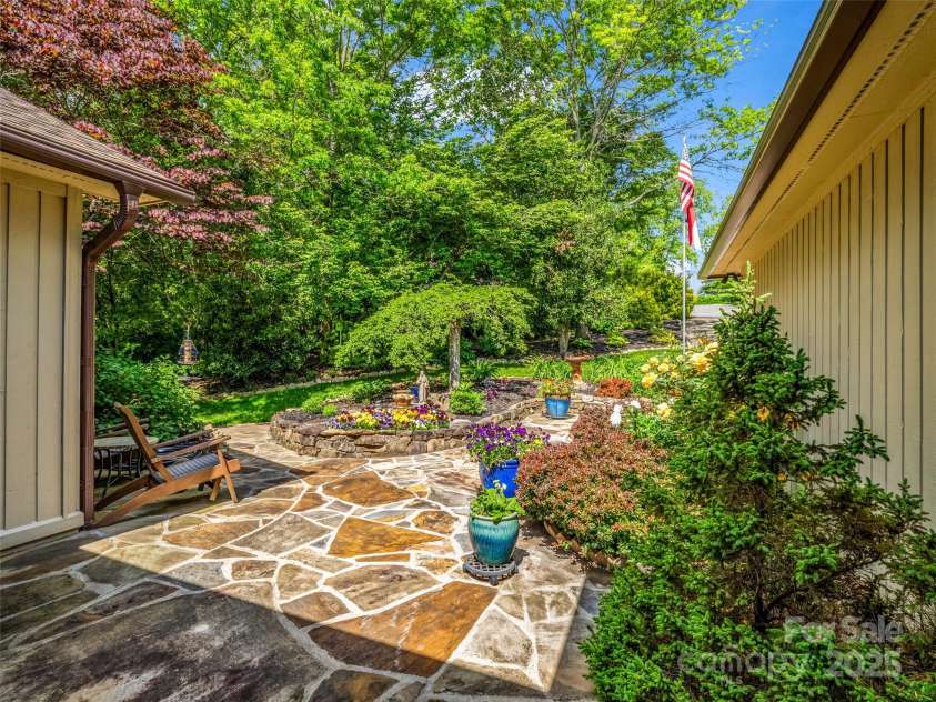 11 Bannerwood Drive, Horse Shoe, NC 28742.  MLS# CAR4257161, YatesRealty ID 25194. Stone sidewalk at front entry