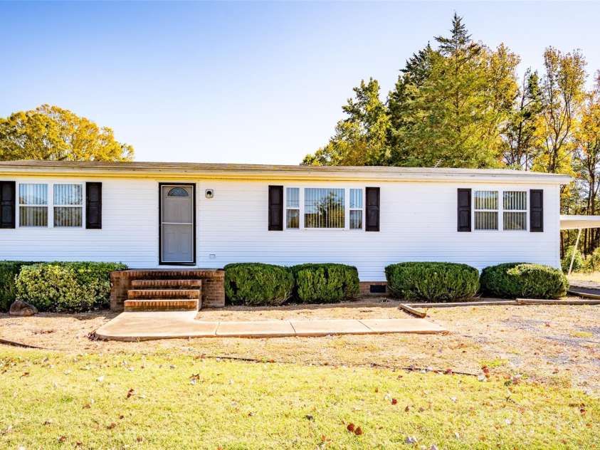110 Jenkins Farm Lane, Mooresville, NC 28115.  MLS# CAR4316175, YatesRealty ID 252. Modular w/Carport