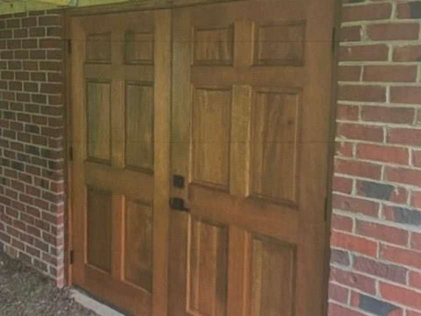 120 Crawford Street, Monroe, NC 28112.  MLS# CAR4382941, YatesRealty ID 25202. Entry to storage under house