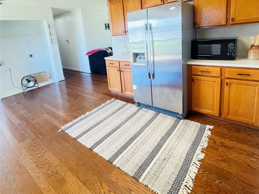 286 Little Wilkesboro Road, Harmony, NC 28634.  MLS# CAR4277638, YatesRealty ID 25207. Kitchen and view of Laundry area