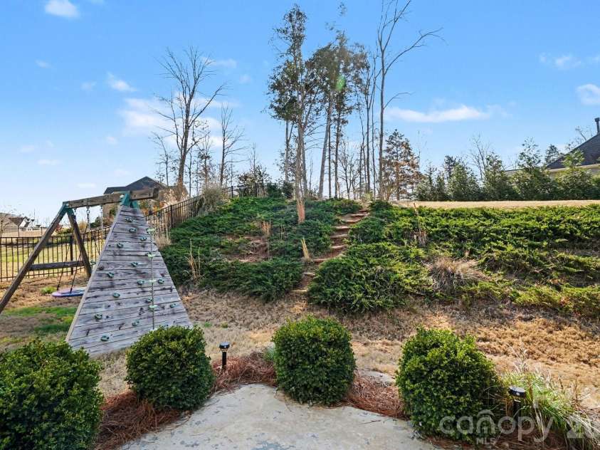 10885 Greenvale Drive, Harrisburg, NC 28075.  MLS# CAR4356120, YatesRealty ID 25209. Back yard
