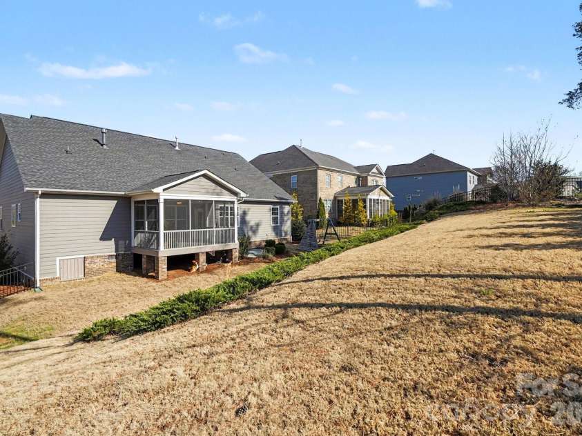 10885 Greenvale Drive, Harrisburg, NC 28075.  MLS# CAR4356120, YatesRealty ID 25209. Back yard