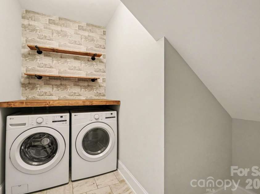 10885 Greenvale Drive, Harrisburg, NC 28075.  MLS# CAR4356120, YatesRealty ID 25209. Laundry on the main