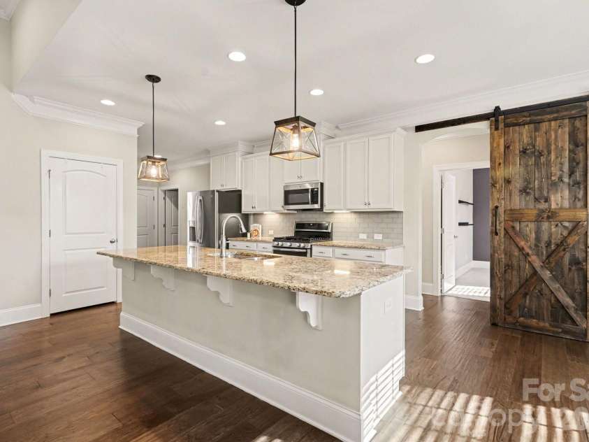 10885 Greenvale Drive, Harrisburg, NC 28075.  MLS# CAR4356120, YatesRealty ID 25209. Spacious island
