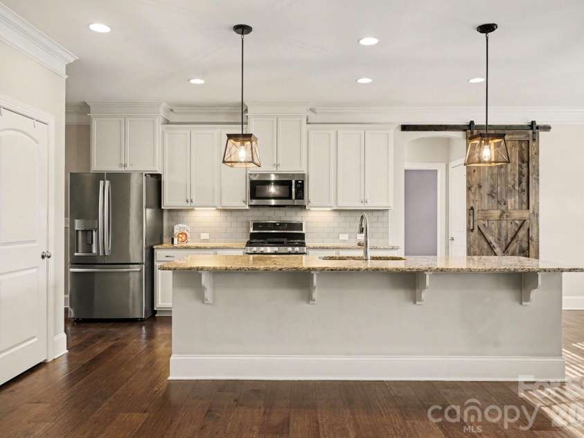 10885 Greenvale Drive, Harrisburg, NC 28075.  MLS# CAR4356120, YatesRealty ID 25209. Spacious island