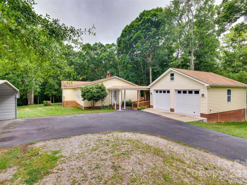 5530 Carter Court, Rock Hill, SC 29732.  MLS# CAR4277770, YatesRealty ID 25210. Side view with Garage and Carport