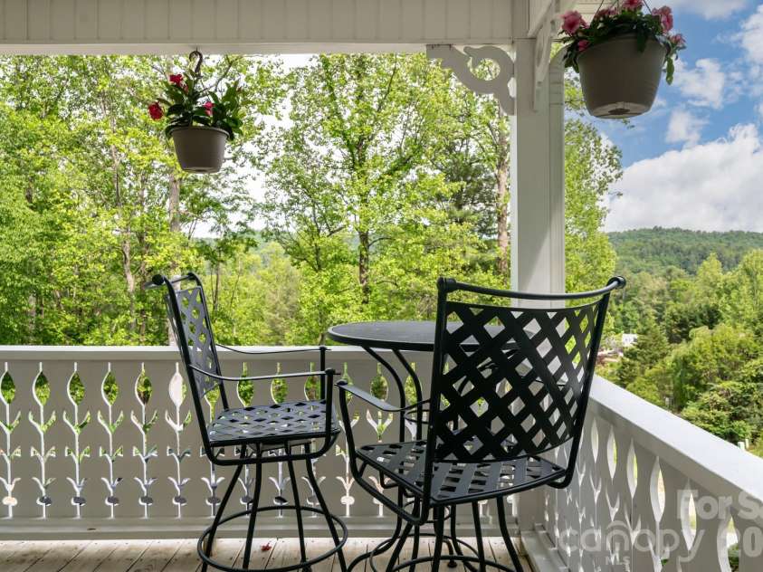10 Terrapin Trail, Flat Rock, NC 28731.  MLS# CAR4381430, YatesRealty ID 25215. Enjoy outdoor dining with a mountain view