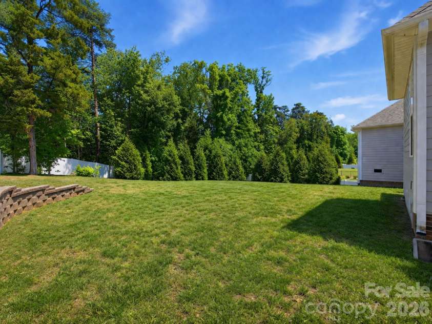4198 Abernathy Place, Harrisburg, NC 28075.  MLS# CAR4378263, YatesRealty ID 25218. Spacious Backyard