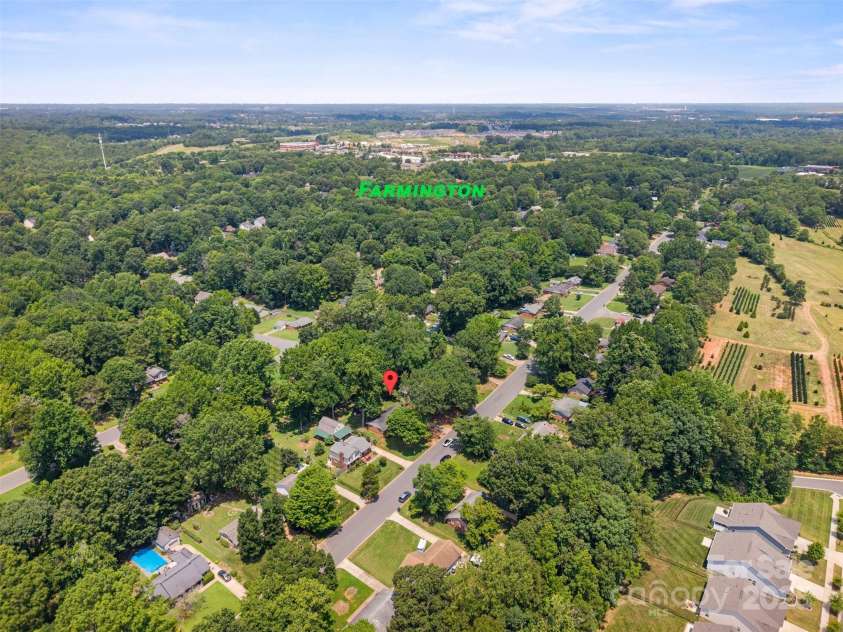 10108 Starwood Drive, Charlotte, NC 28215.  MLS# CAR4277537, YatesRealty ID 25221. To the left of Farmington is a white cell tower.  That is Hwy 485 exit 36.  At this exit you are  approx 12 minute to Matthews, Mint Hill area and in the opposite direction is Hwy 85, Concord Mills (approx 10 mins dri