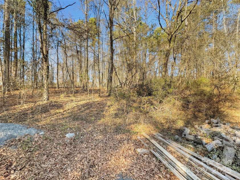 3215 Shadybark Trail, Catawba, SC 29704.  MLS# CAR4329918, YatesRealty ID 25226. Backyard heavily wooded