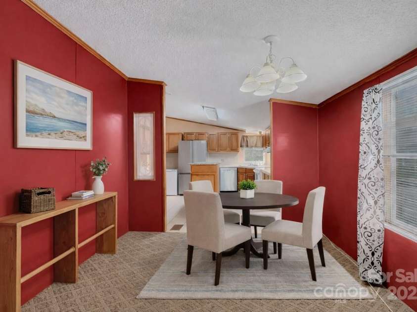 3215 Shadybark Trail, Catawba, SC 29704.  MLS# CAR4329918, YatesRealty ID 25226. Dining area between kitchen and Living room *virtually staged