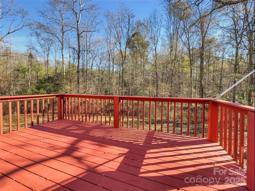 3215 Shadybark Trail, Catawba, SC 29704.  MLS# CAR4329918, YatesRealty ID 25226. Front porch over looking fenced in front yard and all the woods