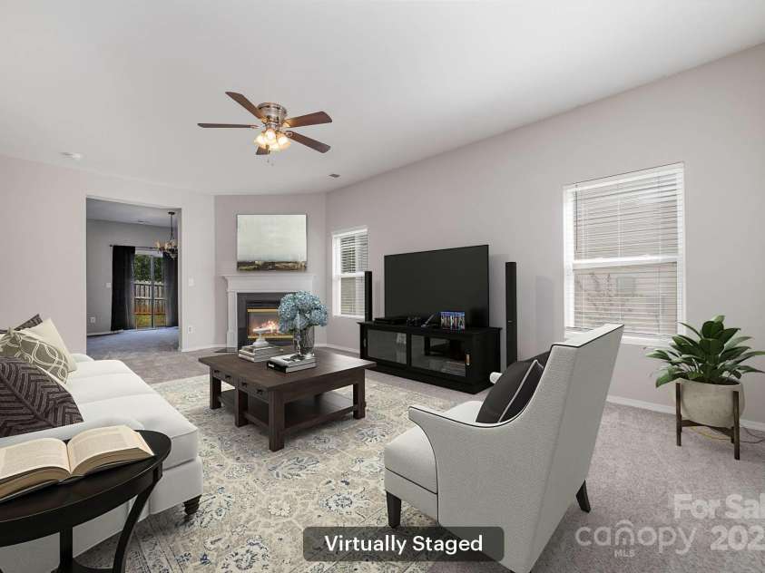 4803 Roxfield Lane, Charlotte, NC 28215.  MLS# CAR4189559, YatesRealty ID 2523. Family Room - Virtually Staged