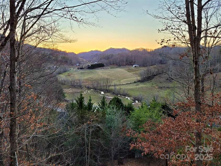108 Pinnacle Road, Burnsville, NC 28714.  MLS# CAR4228730, YatesRealty ID 25231. Afternoon view.