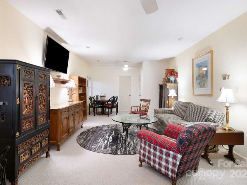 108 Pinnacle Road, Burnsville, NC 28714.  MLS# CAR4228730, YatesRealty ID 25231. Lower level Living