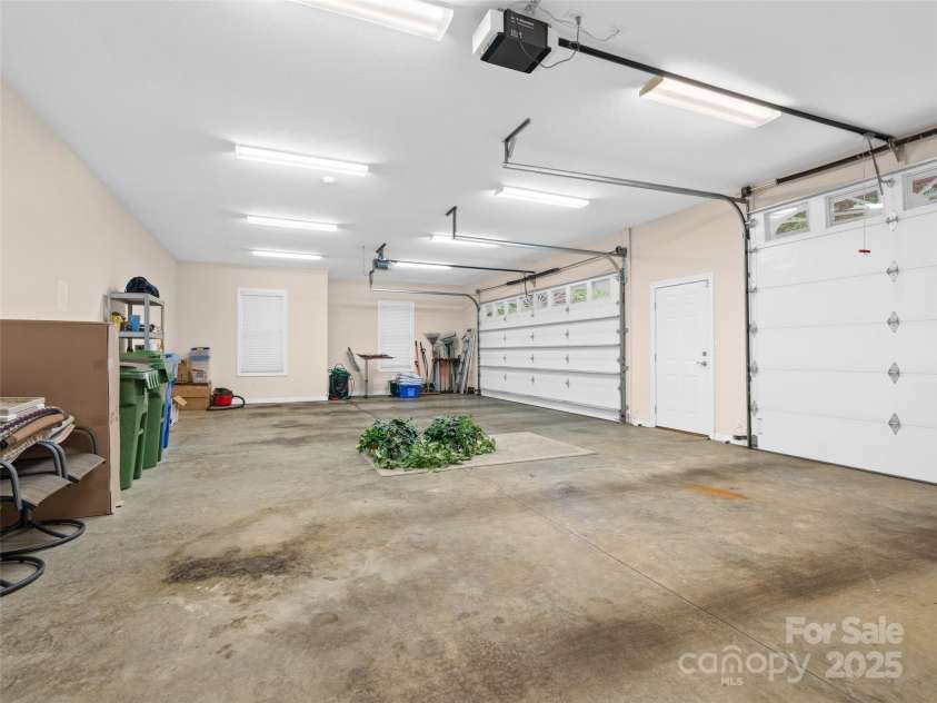 5 Reynolds Place, Asheville, NC 28804.  MLS# CAR4243705, YatesRealty ID 25235. 3 car garage with storage space