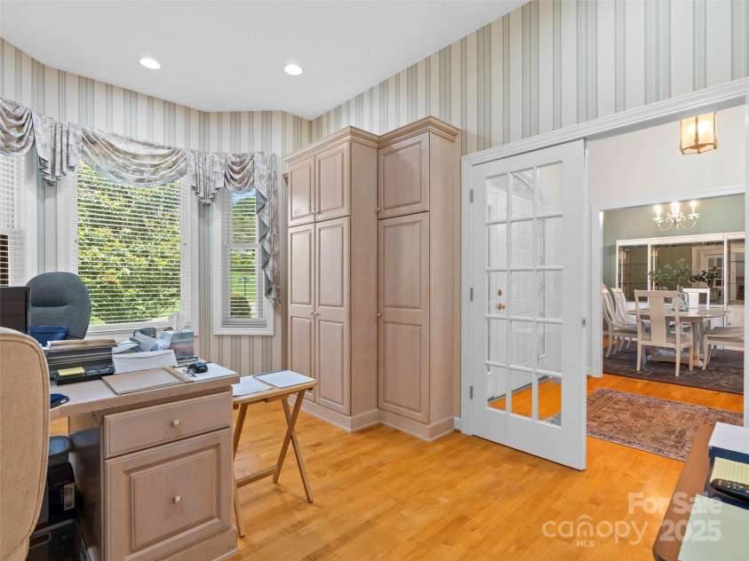5 Reynolds Place, Asheville, NC 28804.  MLS# CAR4243705, YatesRealty ID 25235. Office with custom builtins