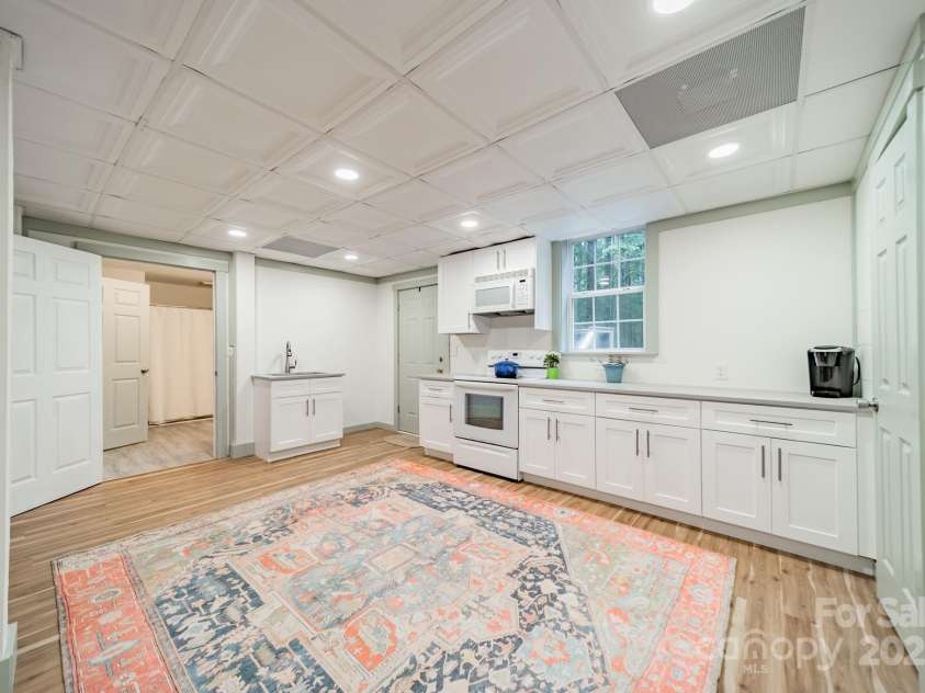 1594 High Ridge Drive, Stanley, NC 28164.  MLS# CAR4279439, YatesRealty ID 25239. Finished Basement Kitchenette