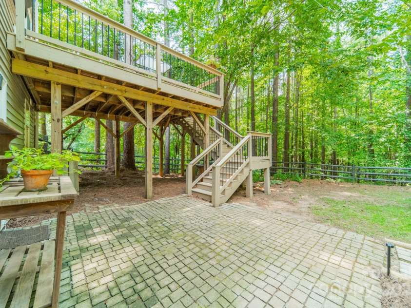 1594 High Ridge Drive, Stanley, NC 28164.  MLS# CAR4279439, YatesRealty ID 25239. Large Deck off of Living Room & Backyard