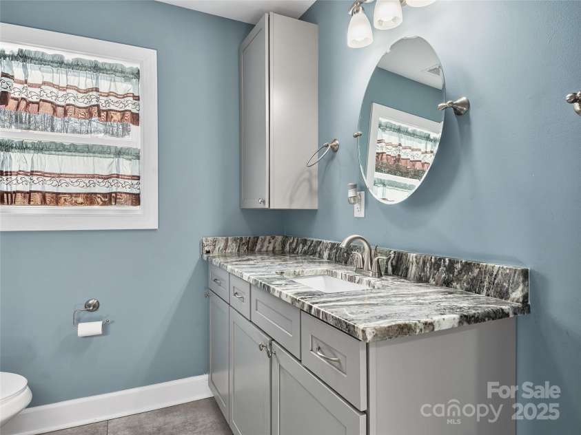 611 Peniel Road, Columbus, NC 28722.  MLS# CAR4327826, YatesRealty ID 2524. Guest Bathroom