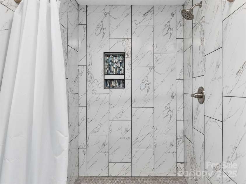 611 Peniel Road, Columbus, NC 28722.  MLS# CAR4327826, YatesRealty ID 2524. Walk-in shower in Primary 