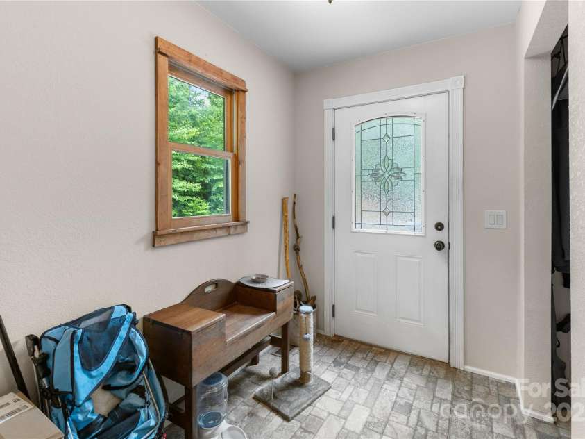 219 Sandalwood Drive, Whittier, NC 28789.  MLS# CAR4255681, YatesRealty ID 25244. 