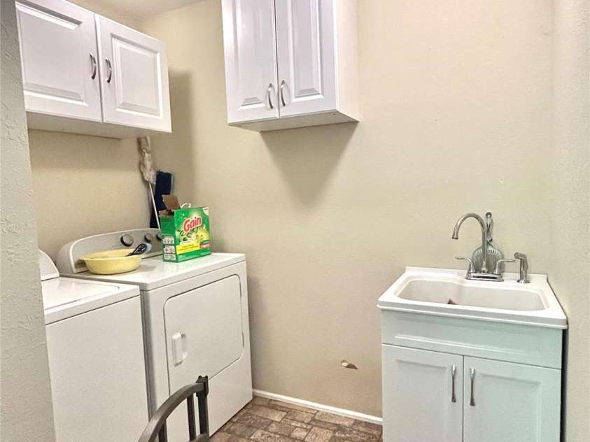 219 Sandalwood Drive, Whittier, NC 28789.  MLS# CAR4255681, YatesRealty ID 25244. Laundry