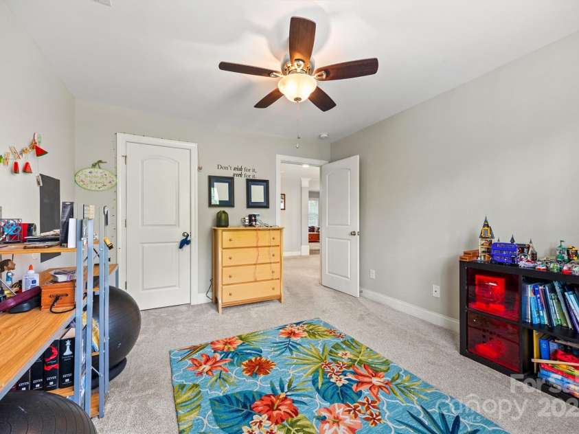 3095 Foggy Hollow Lane, Clover, SC 29710.  MLS# CAR4243248, YatesRealty ID 25252. Bedroom #3 upstairs with large closet and fan