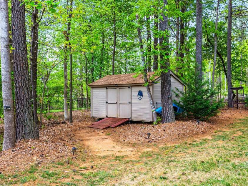 3095 Foggy Hollow Lane, Clover, SC 29710.  MLS# CAR4243248, YatesRealty ID 25252. Large storage shed in the backyard