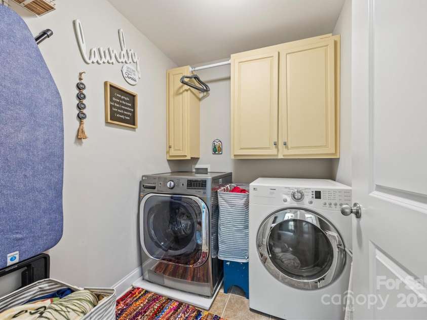 3095 Foggy Hollow Lane, Clover, SC 29710.  MLS# CAR4243248, YatesRealty ID 25252. Laundry room upstairs with cabinets for storage