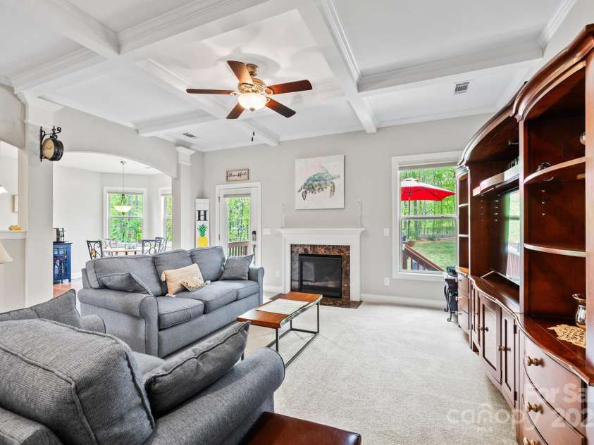 3095 Foggy Hollow Lane, Clover, SC 29710.  MLS# CAR4243248, YatesRealty ID 25252. Spacious great room with coffered ceiling and gas fireplace