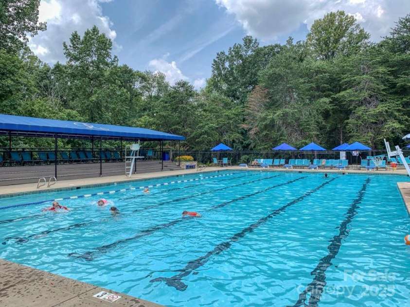19679 Wooden Tee Drive, Davidson, NC 28036.  MLS# CAR4258951, YatesRealty ID 25255. Swim lane pool