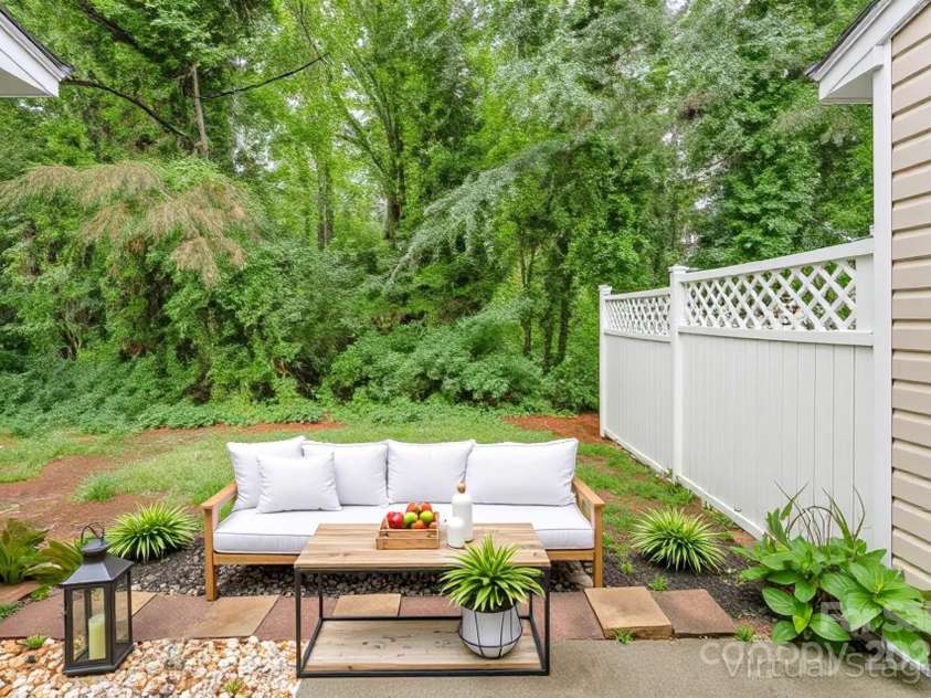 10223 Reindeer Way Lane, Charlotte, NC 28216.  MLS# CAR4268140, YatesRealty ID 25261. Patio virtually staged