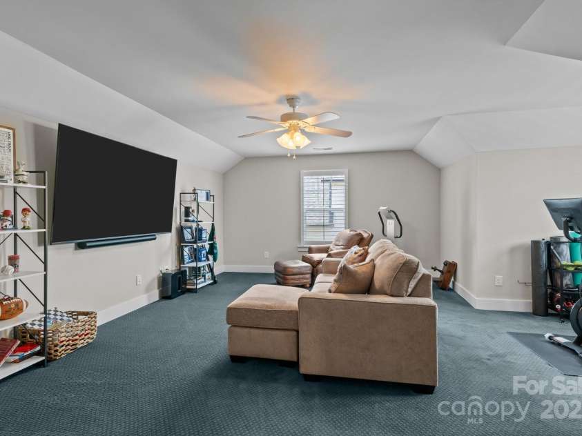 124 Slocumb Lane, Mooresville, NC 28117.  MLS# CAR4271314, YatesRealty ID 25265. Bonus room with TV to convey