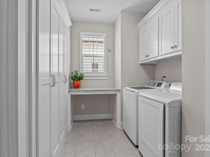 124 Slocumb Lane, Mooresville, NC 28117.  MLS# CAR4271314, YatesRealty ID 25265. Downstairs laundry