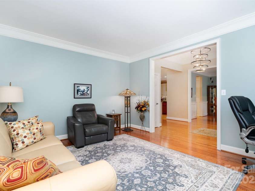 3813 Beauvista Drive, Charlotte, NC 28269.  MLS# CAR4275235, YatesRealty ID 25268. Another view of the formal living looking into the foyer